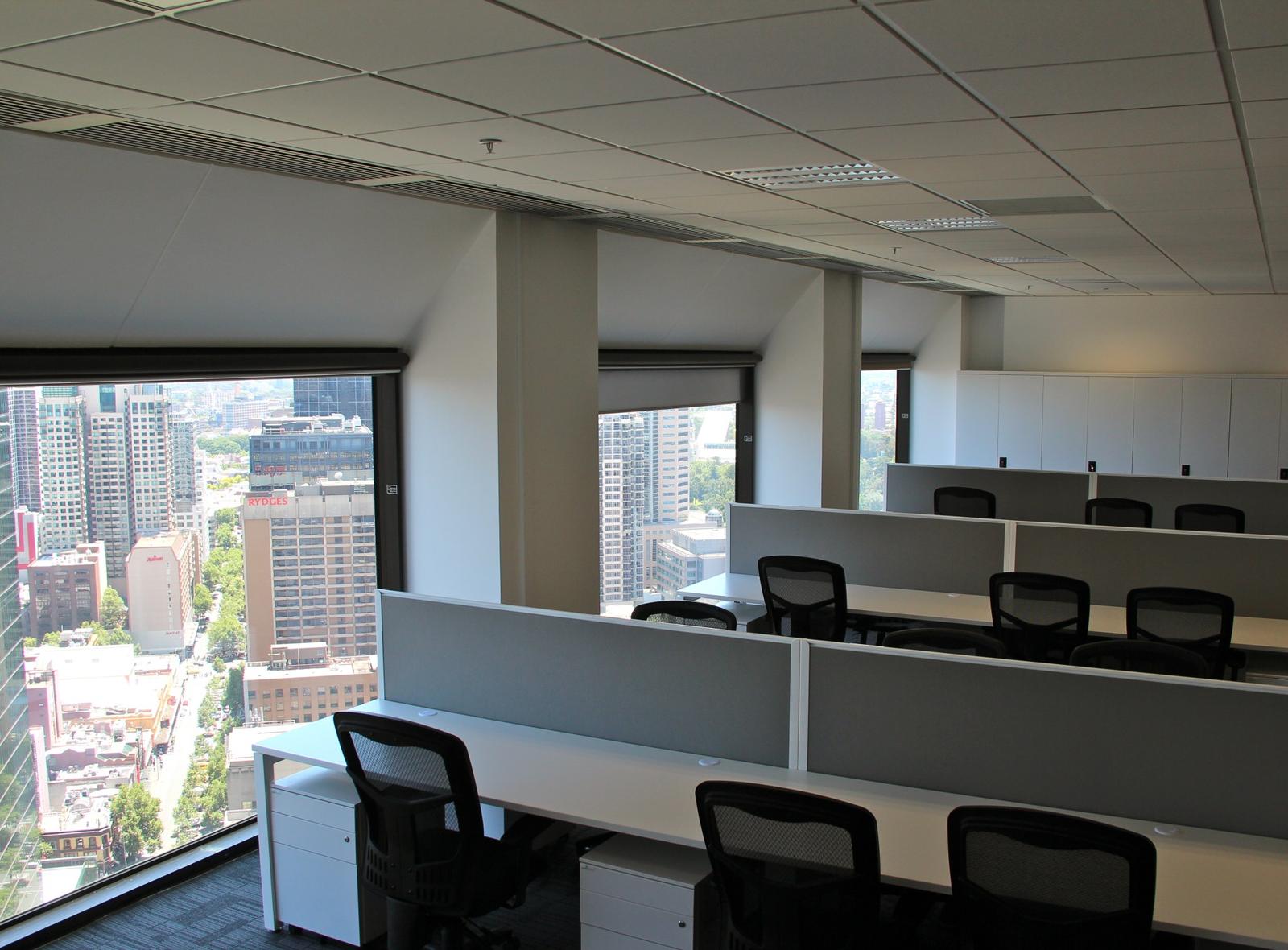 Open plan workstations and desk screens installed for Ausin Group