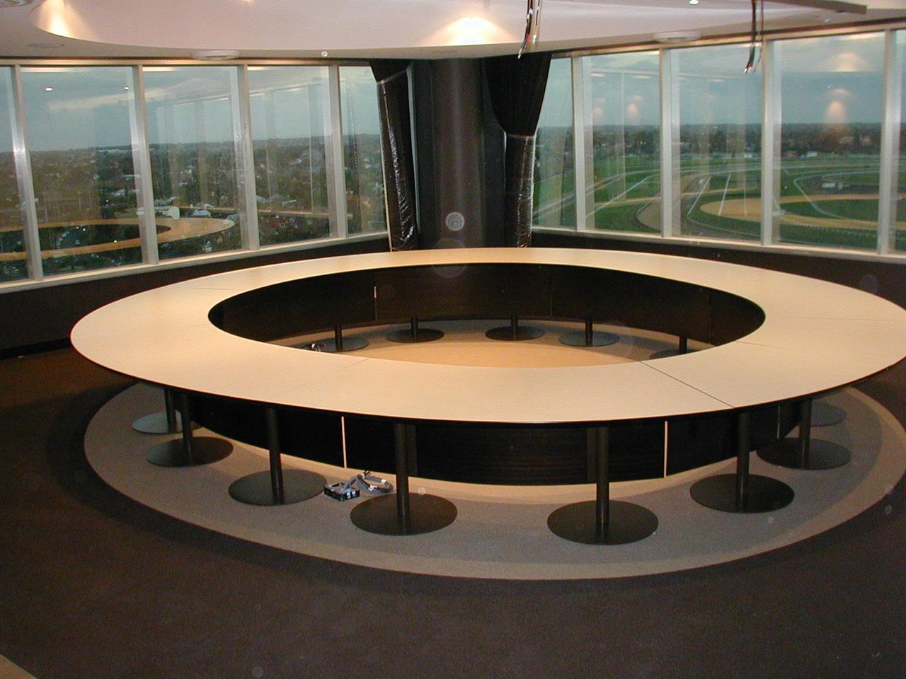 Custom oval boardroom table built and installed by Integrity Office