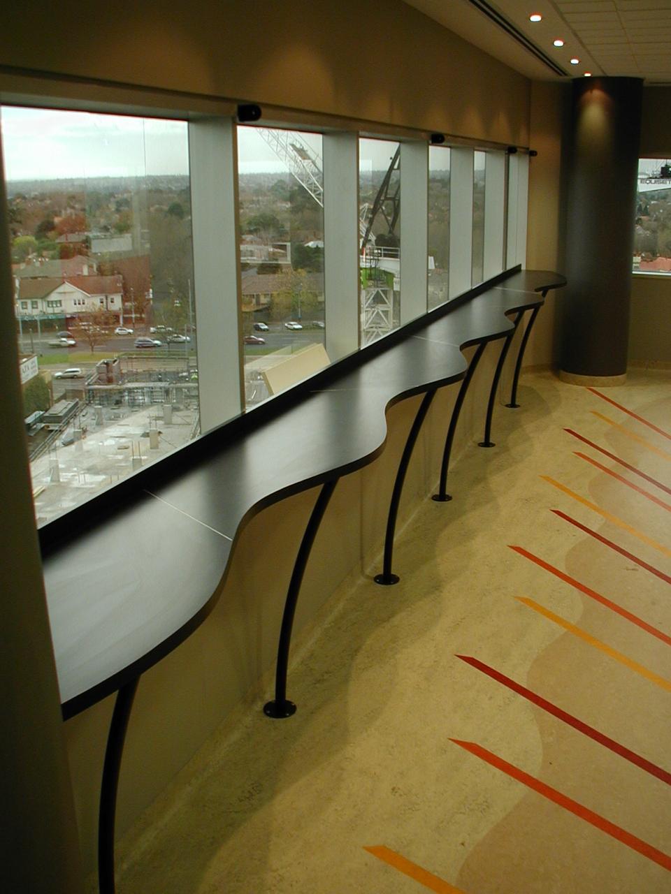 Curved window bench joinery in a Melbourne office fitout